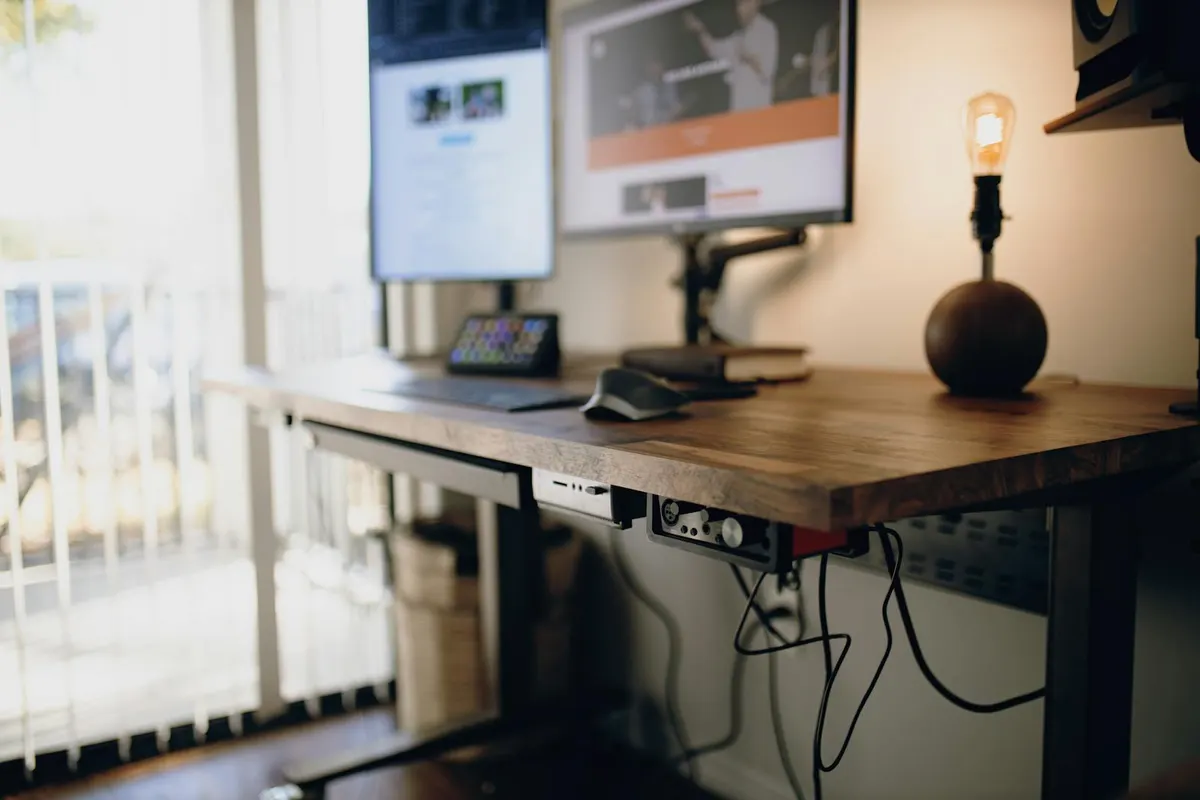 Three standing desks side by side